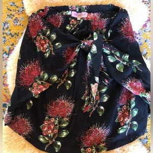 Alohiwai faux wrap skirt. Black with red lehua.